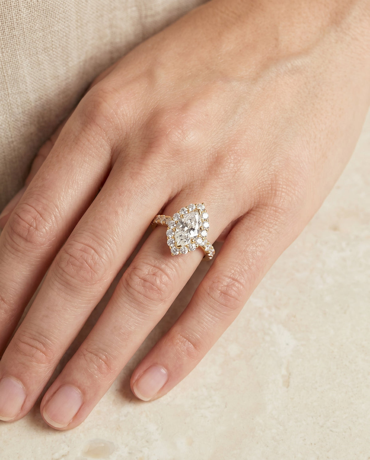 Alannah Select Halo Marquise Lab Diamond Engagement Ring in 18K Yellow Gold, shown on hand | RockHer