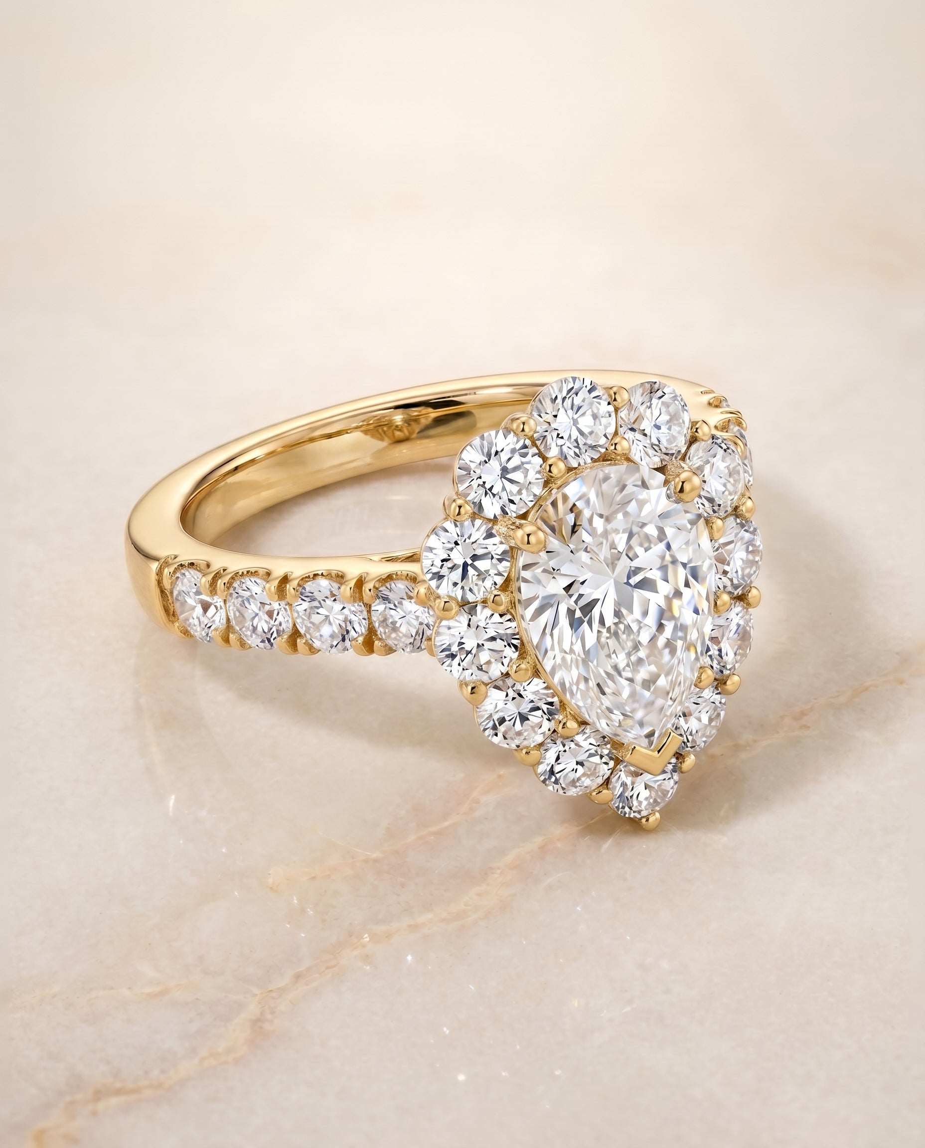 Alannah Select Halo Pear Lab Diamond Engagement Ring in 18K Yellow Gold, shown on hand, angled | RockHer