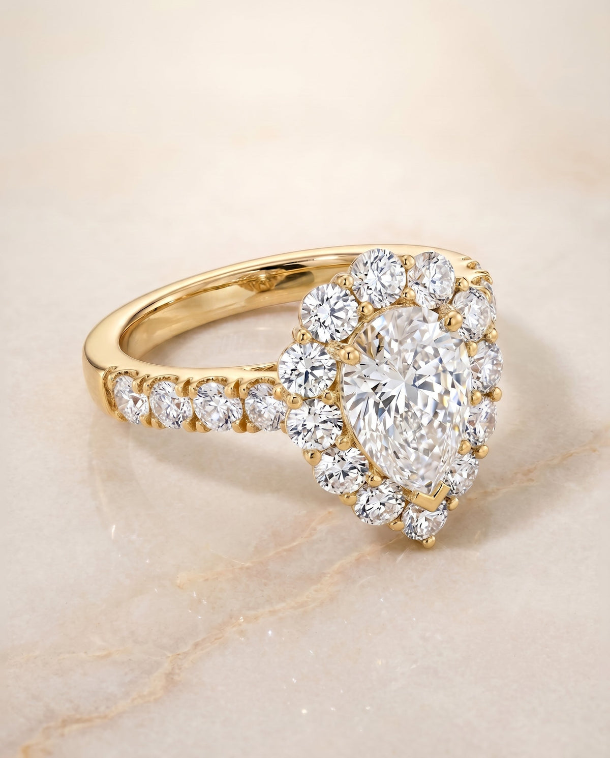 Alannah Select Halo Pear Lab Diamond Engagement Ring in 18K Yellow Gold, shown on hand, angled | RockHer