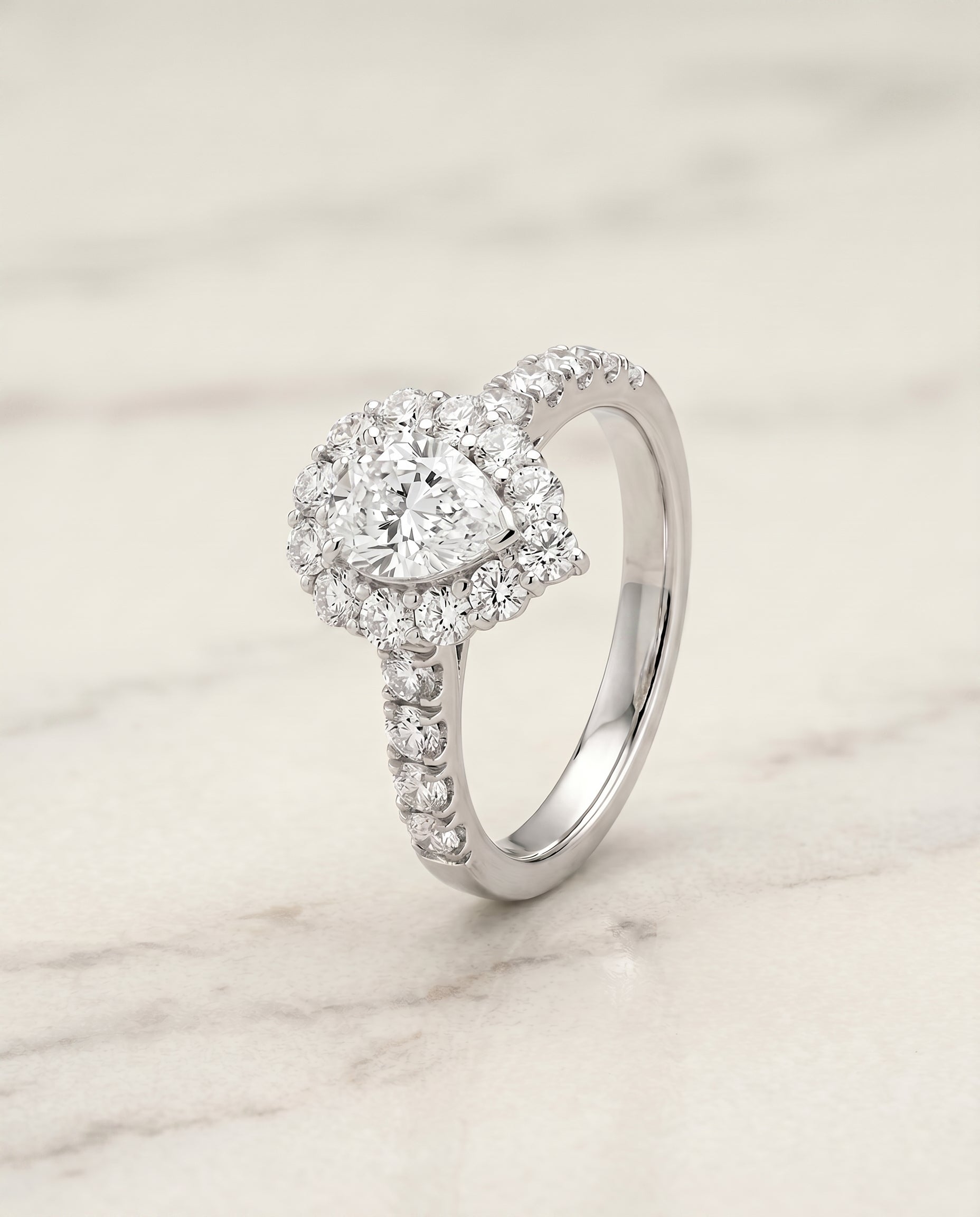 Luxe French Pavé Halo styling on The Alannah pear engagement ring setting | RockHer