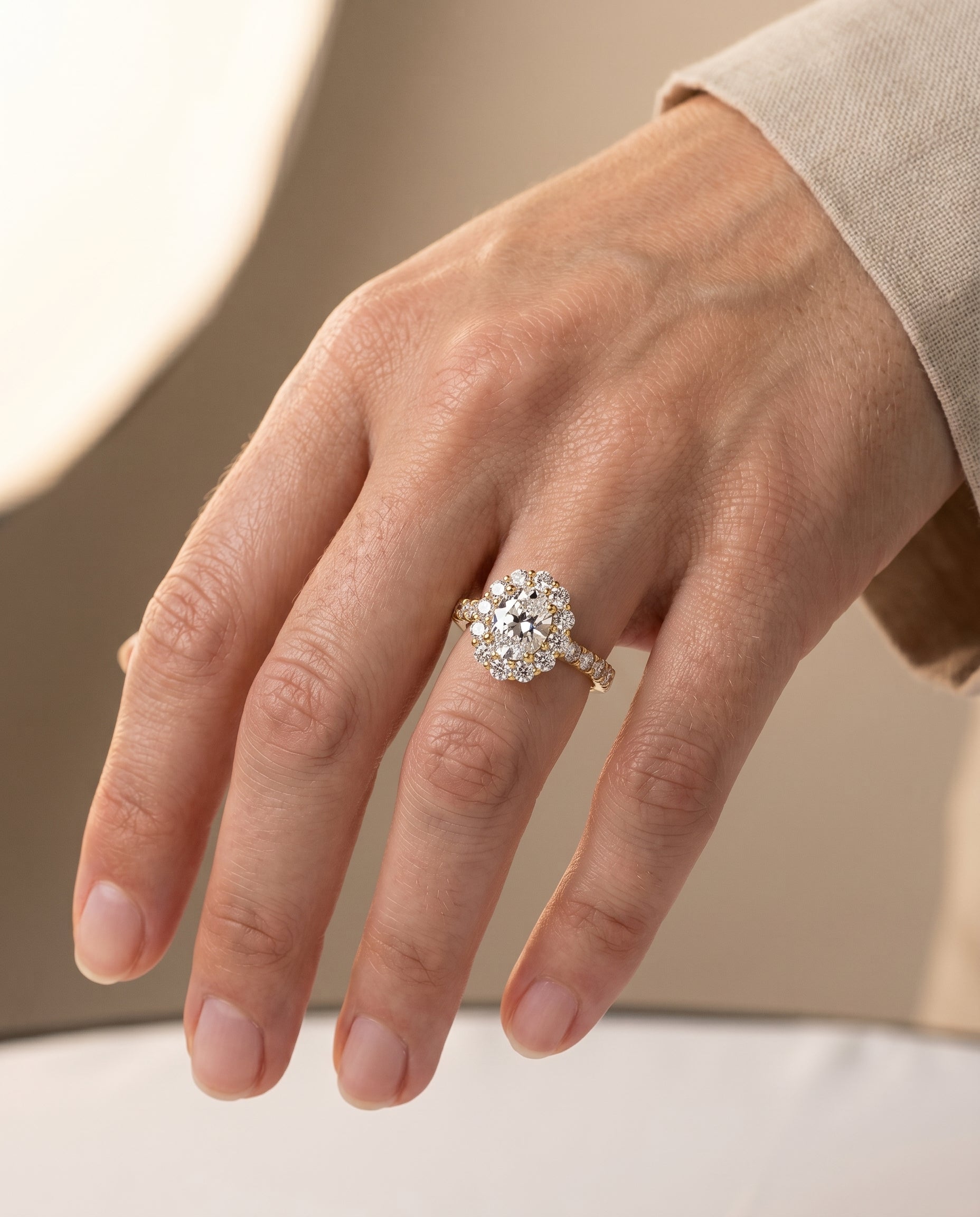 Alannah Select Luxe French Pavé Halo Oval Lab Diamond Engagement Ring in 18K Yellow Gold, shown on hand | RockHer