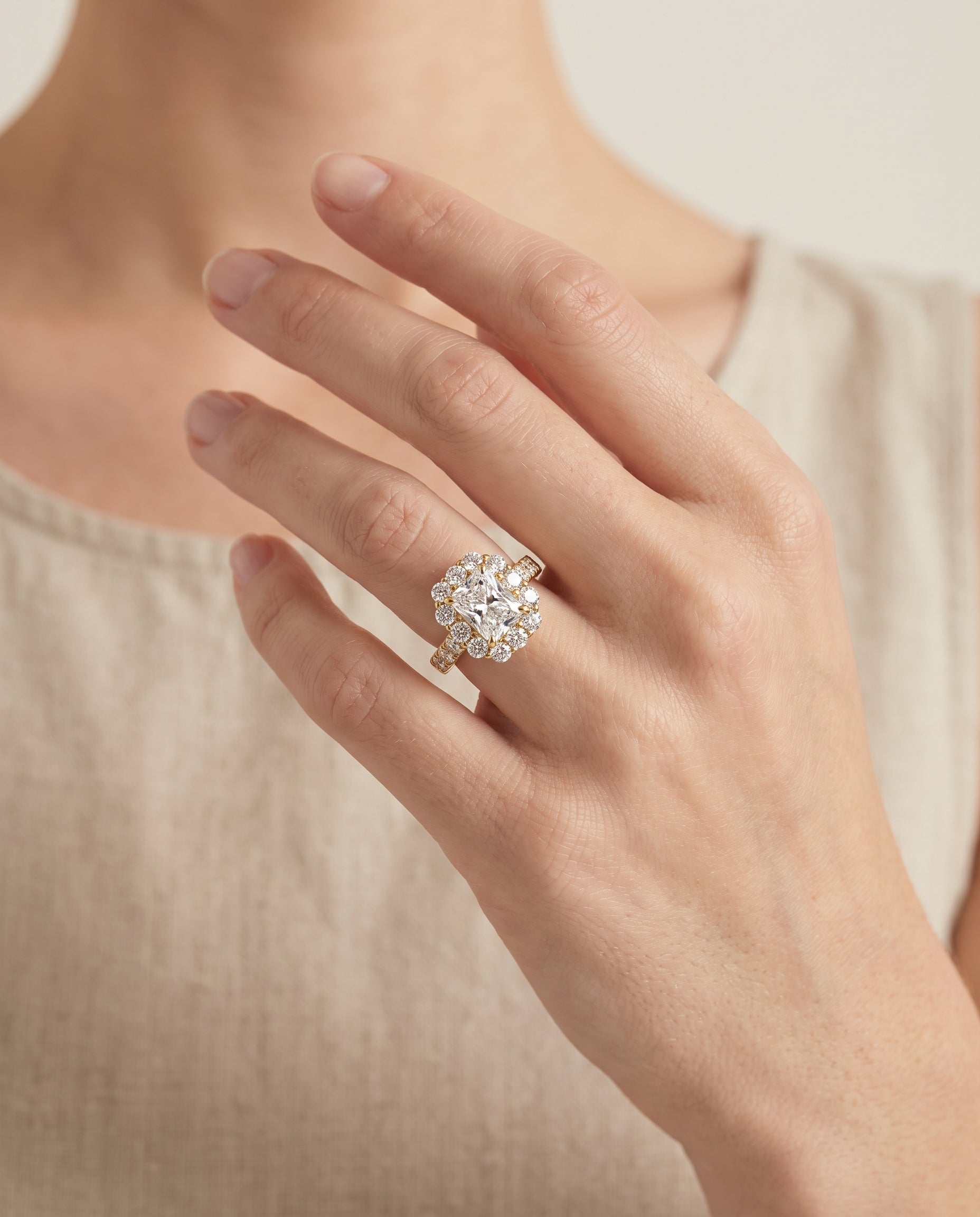 The Alannah engagement ring setting in 18K Yellow Gold, luxe french pavé halo cut design | RockHer