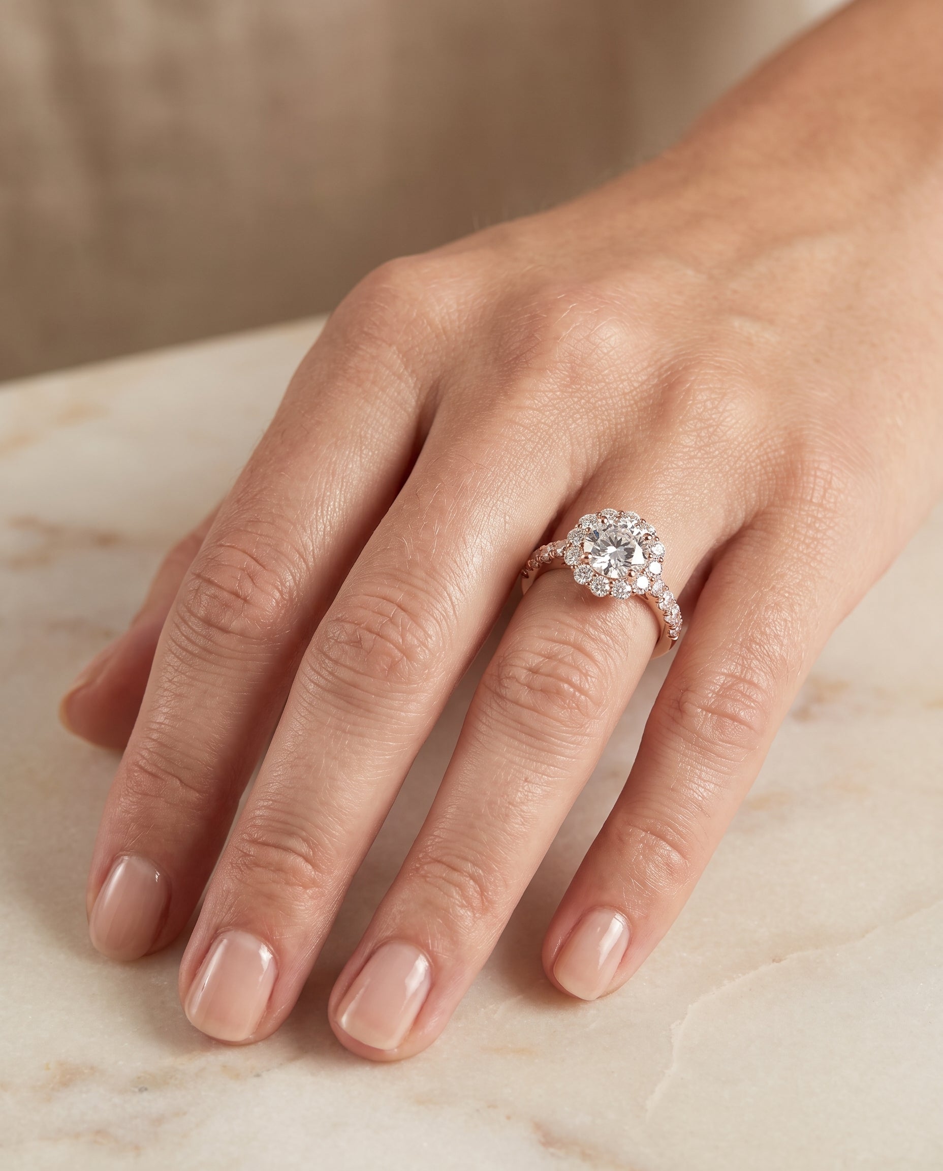 The Alannah engagement ring setting in 14K Rose Gold, luxe french pavé halo design | RockHer