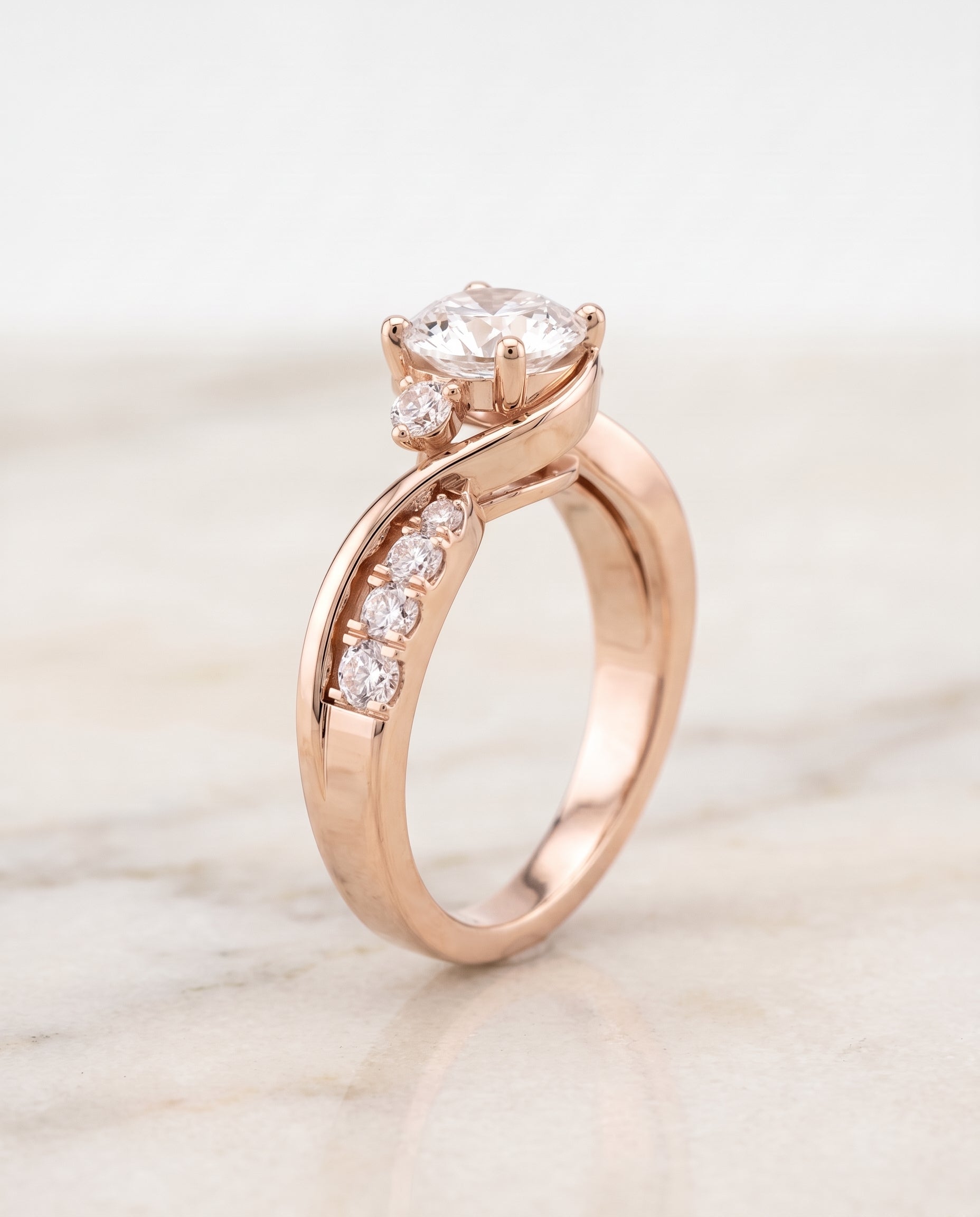 Twisted Three Stone styling on The Alice round engagement ring setting | RockHer