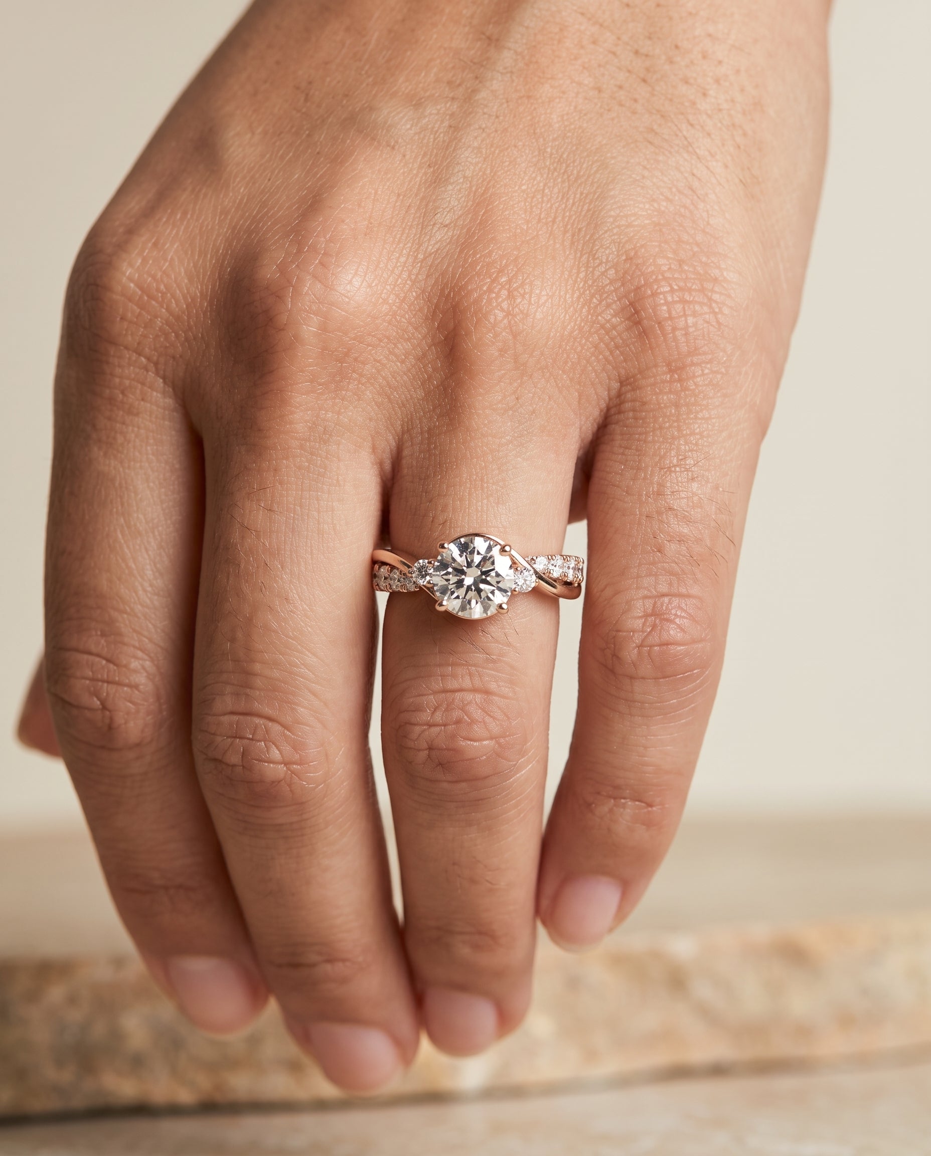 The Alice engagement ring setting in 14K Rose Gold, twisted three stone design | RockHer