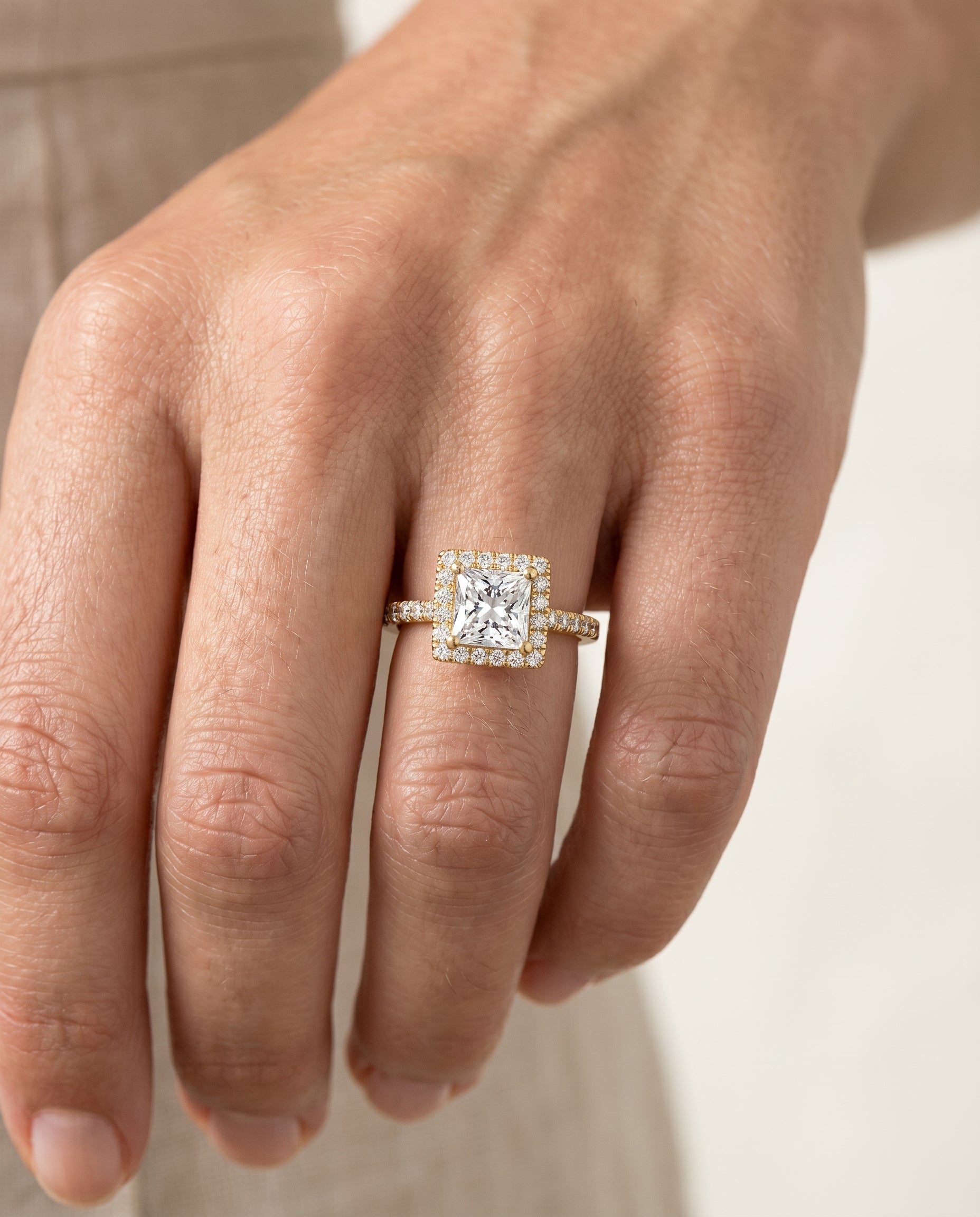 The Allegra engagement ring setting in 18K Yellow Gold, shared prong pavé halo design | RockHer