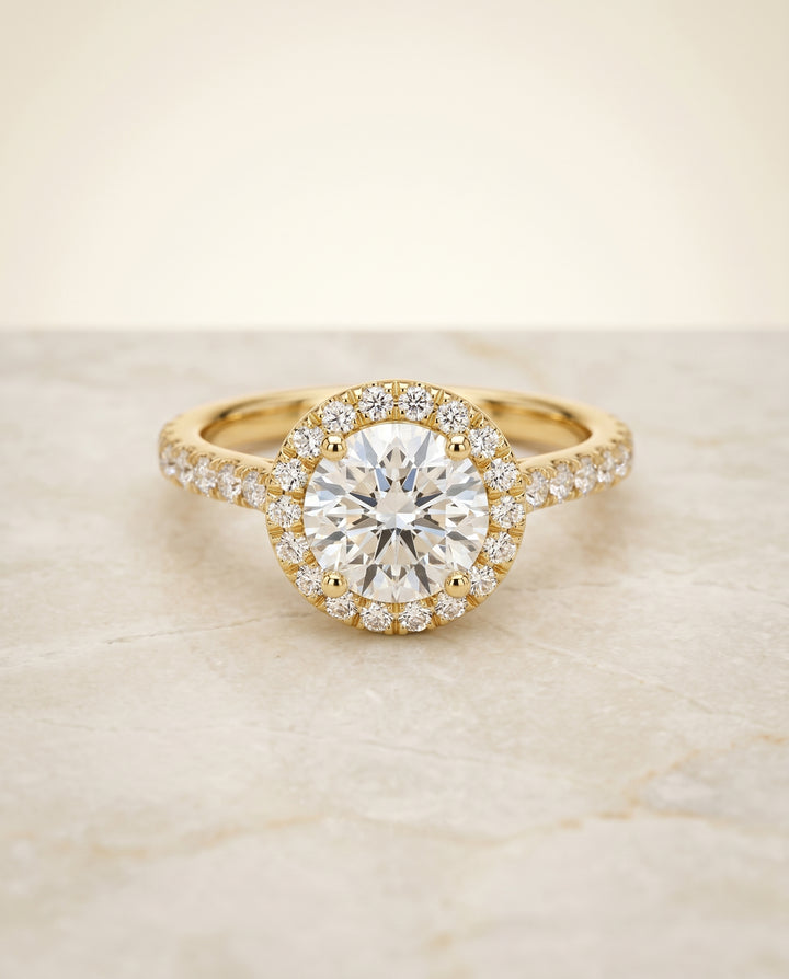 The Allegra Shared Prong Pavé Halo Round Engagement Ring Setting in 18K Yellow Gold