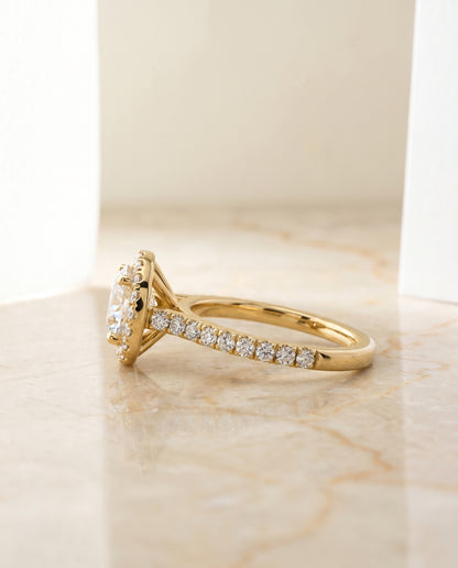 The Allegra Shared Prong Pavé Halo Round Engagement Ring Setting in 18K Yellow Gold