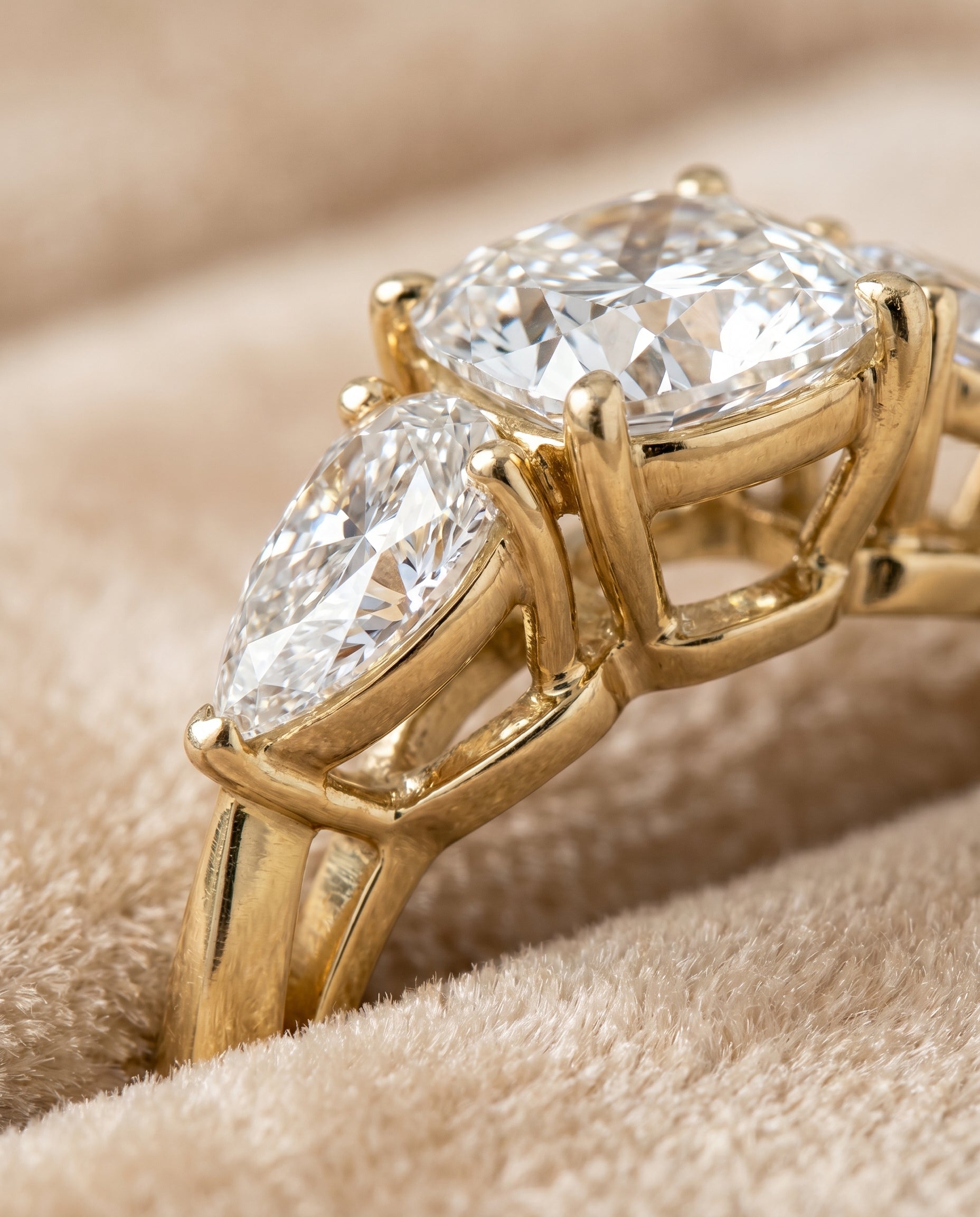 Angelica Select Three Stone Matched Cushion Cut Lab Diamond Engagement Ring in 18K Yellow Gold, detail view | RockHer