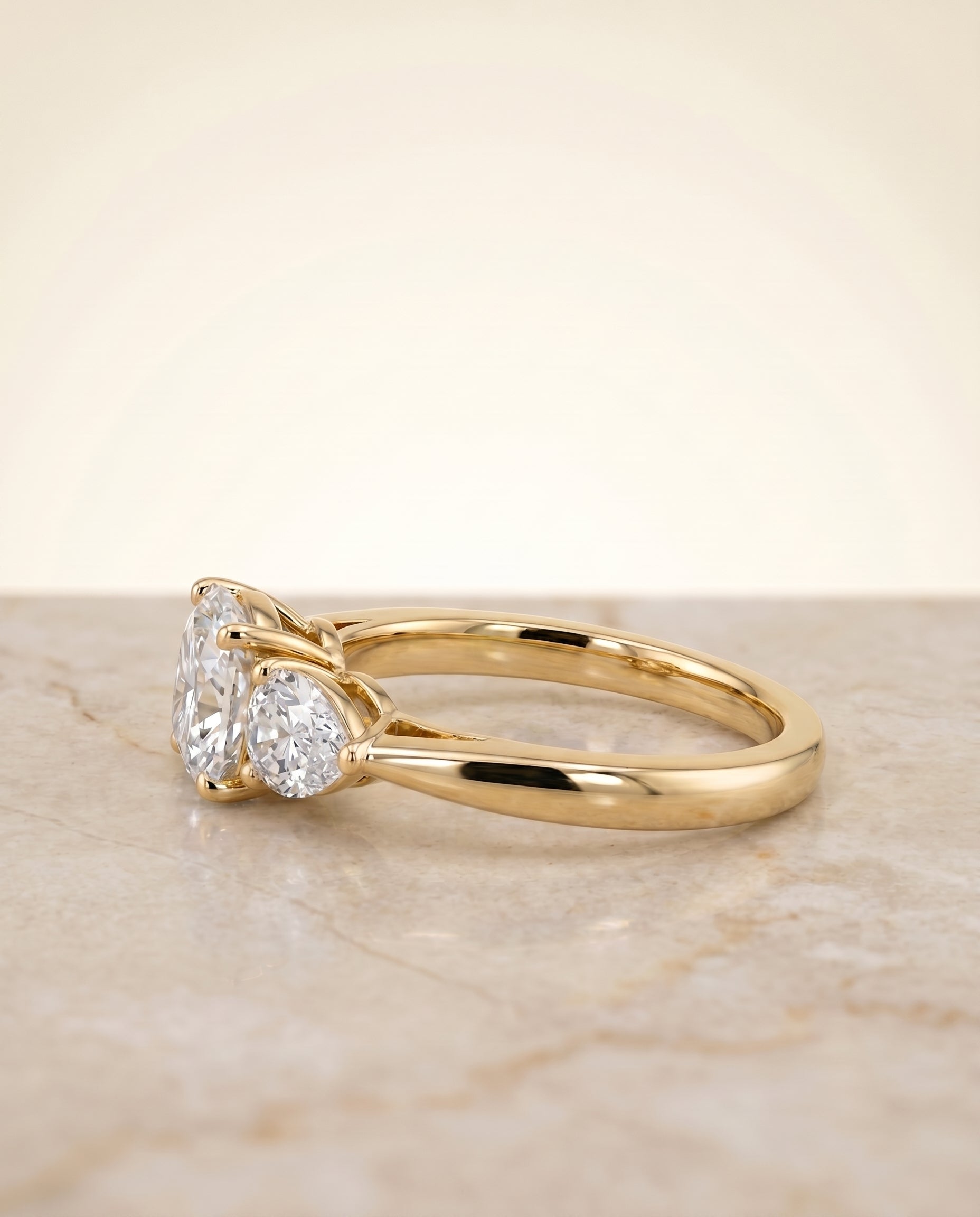 Three Stone Matched Cut styling on The Angelica cushion engagement ring setting | RockHer