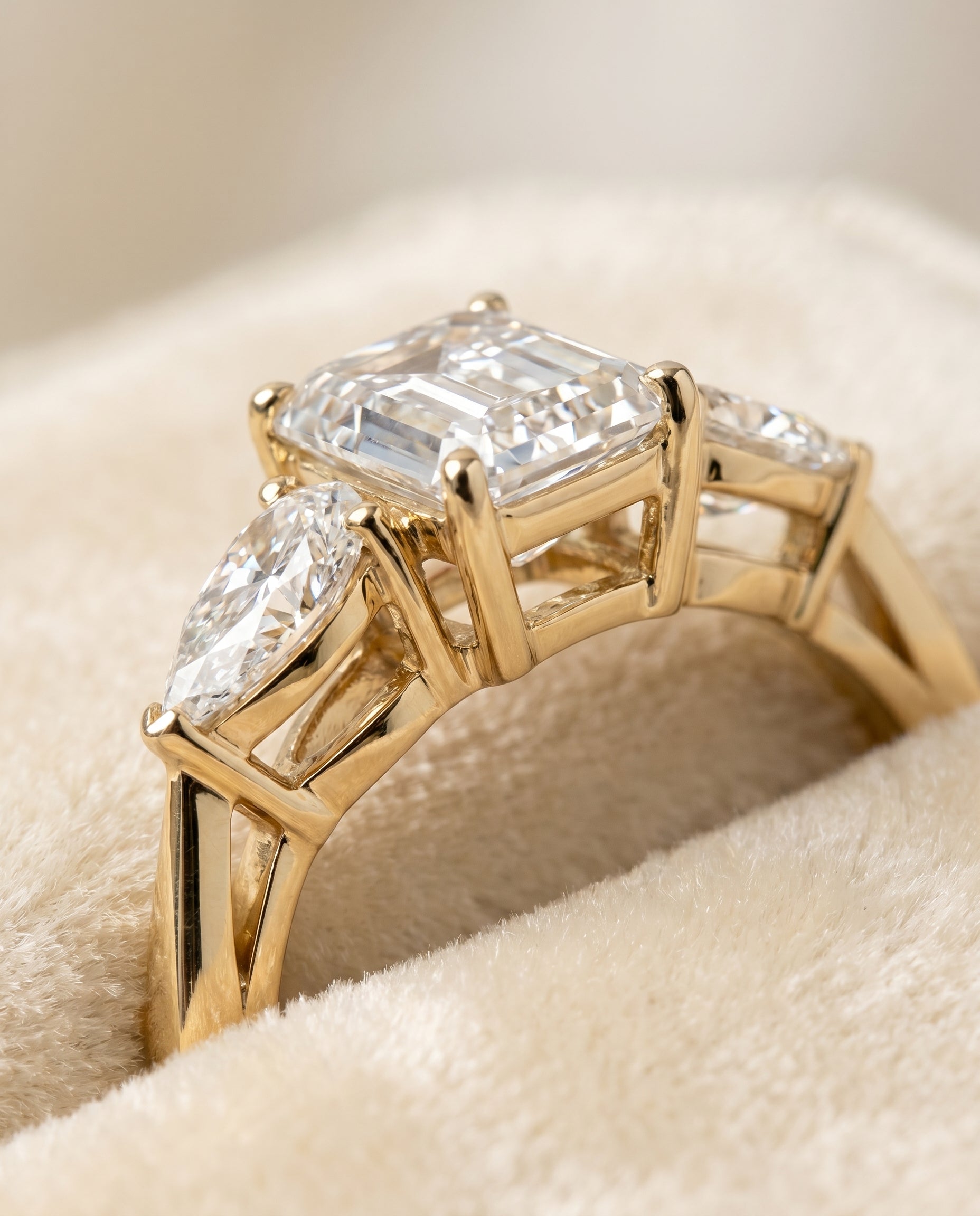 Angelica Select Three Stone Emerald Cut Lab Diamond Engagement Ring in 18K Yellow Gold, detail view | RockHer