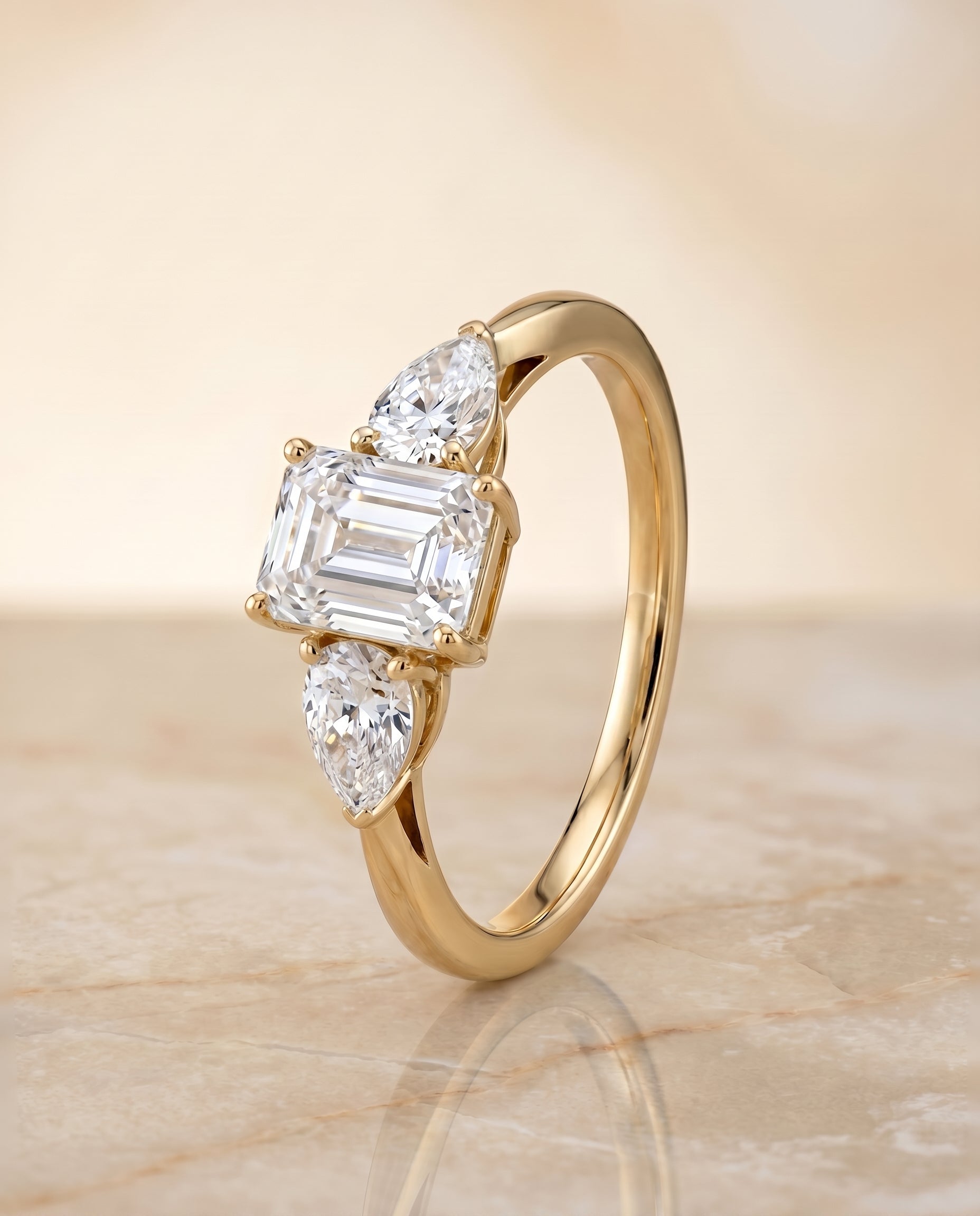 Three Stone Matched Cut styling on The Angelica emerald engagement ring setting | RockHer