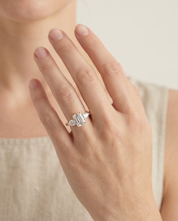 The Angelica Three Stone Engagement Ring Setting for Emerald Cut Diamonds in 18K Yellow Gold