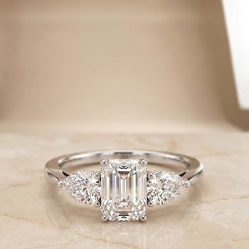 The Angelica Three Stone Matched Emerald Cut Engagement Ring Setting in Platinum