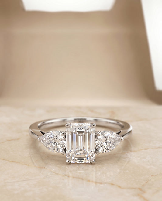 The Angelica Three Stone Engagement Ring Setting for Emerald Cut Diamonds in Platinum