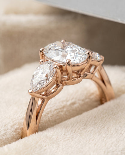 Angelica Select Three Stone Oval Lab Diamond Engagement Ring in 14K Rose Gold, detail view | RockHer