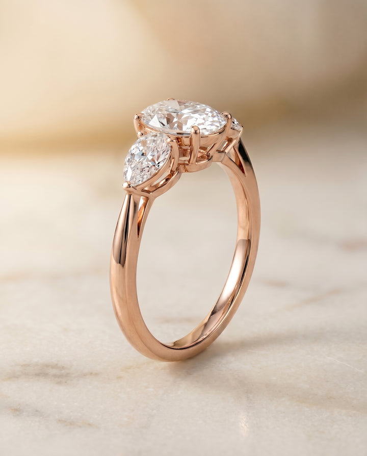 The Angelica Three Stone Engagement Ring Setting for Oval Diamonds in 14K Rose Gold
