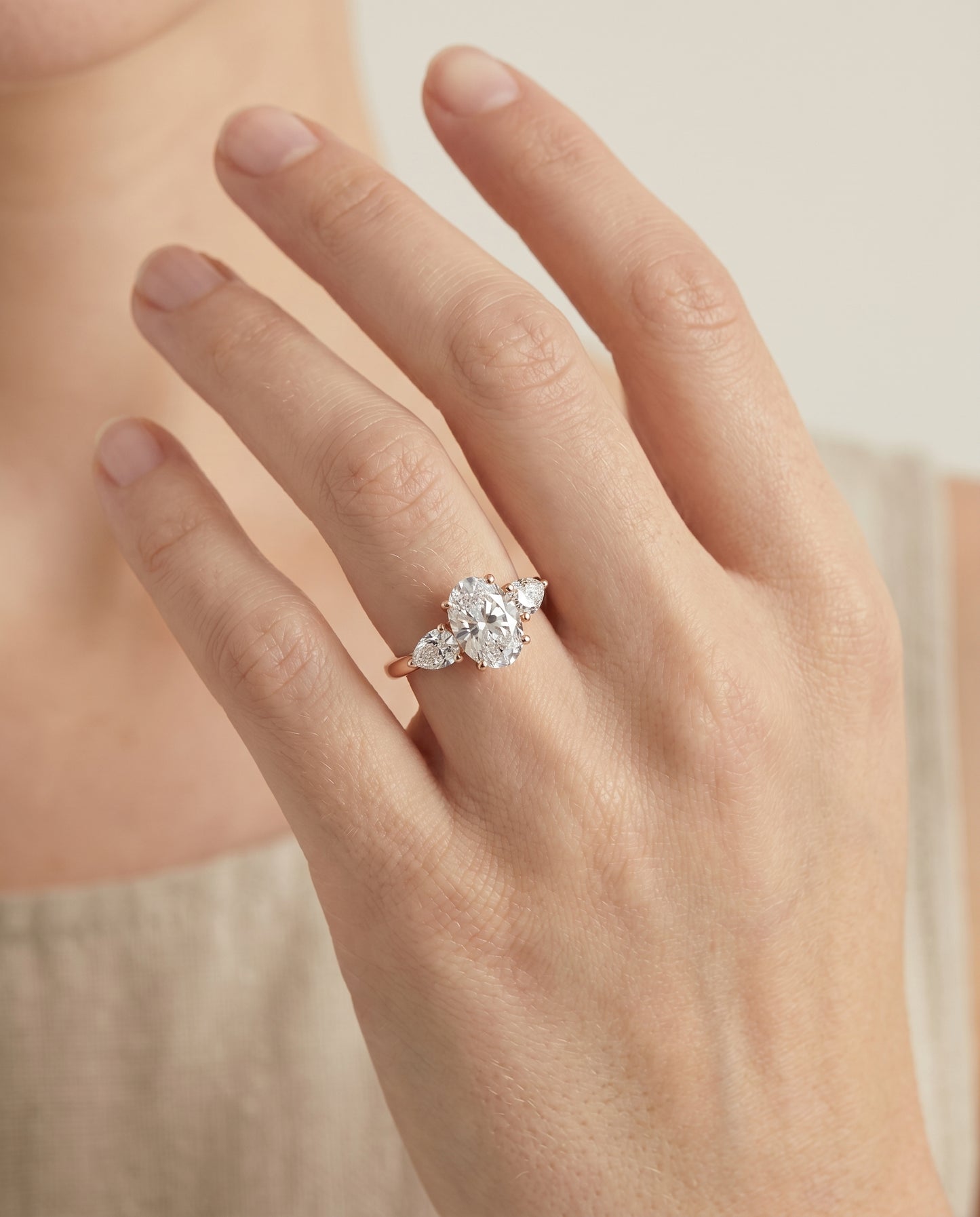 The Angelica Three Stone Engagement Ring Setting for Oval Diamonds in 14K Rose Gold
