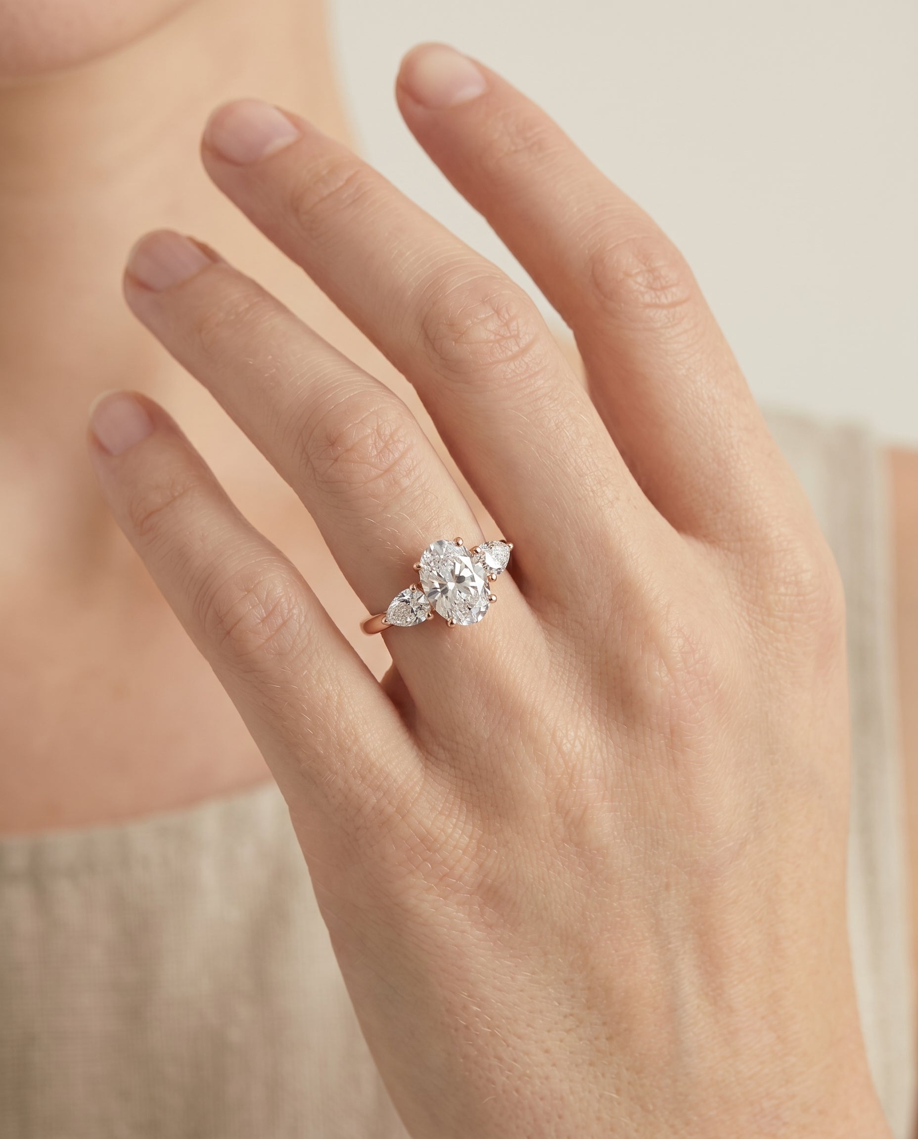 The Angelica engagement ring setting in 14K Rose Gold, three stone matched design | RockHer