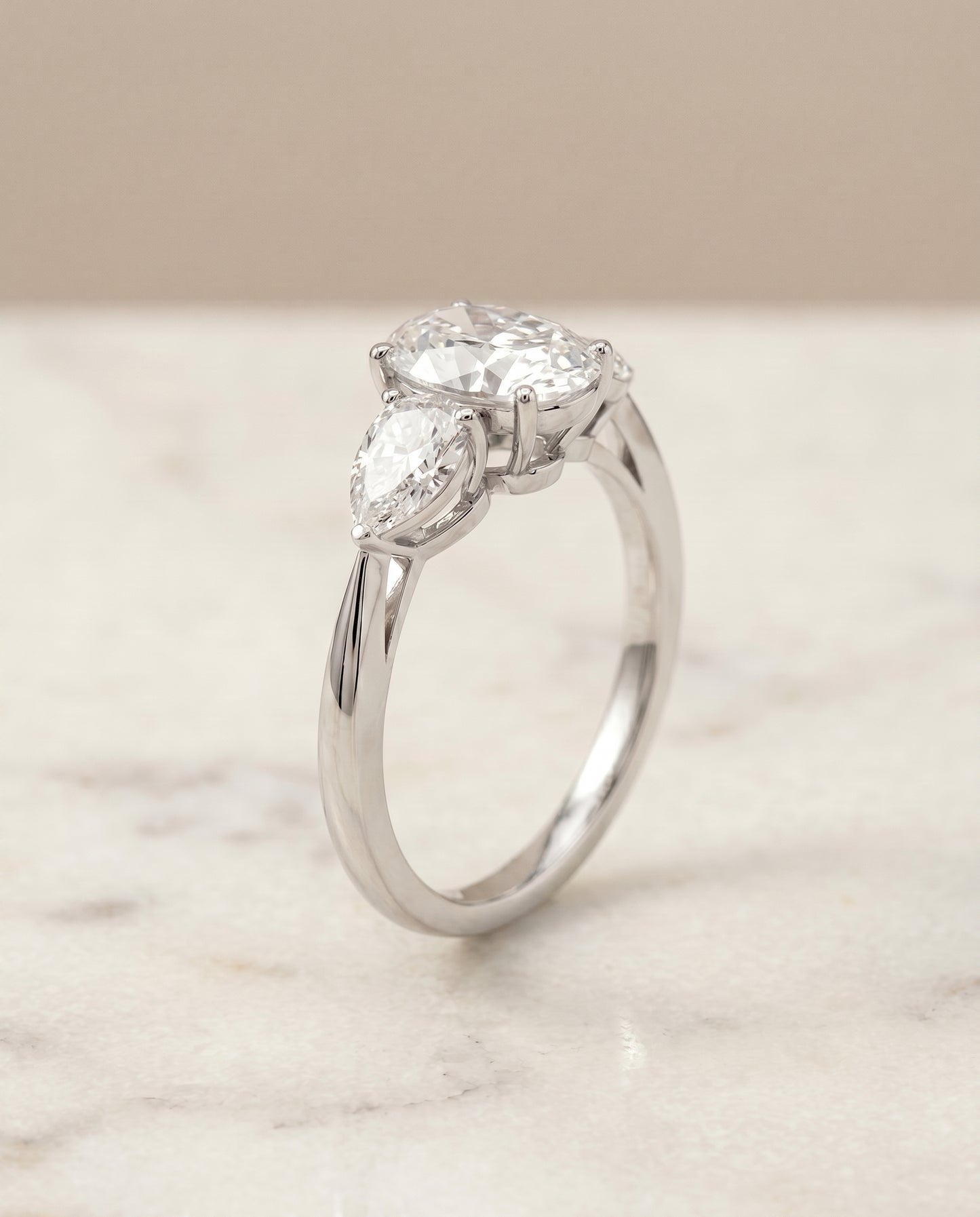 The Angelica Three Stone Engagement Ring Setting for Oval Diamonds in Platinum