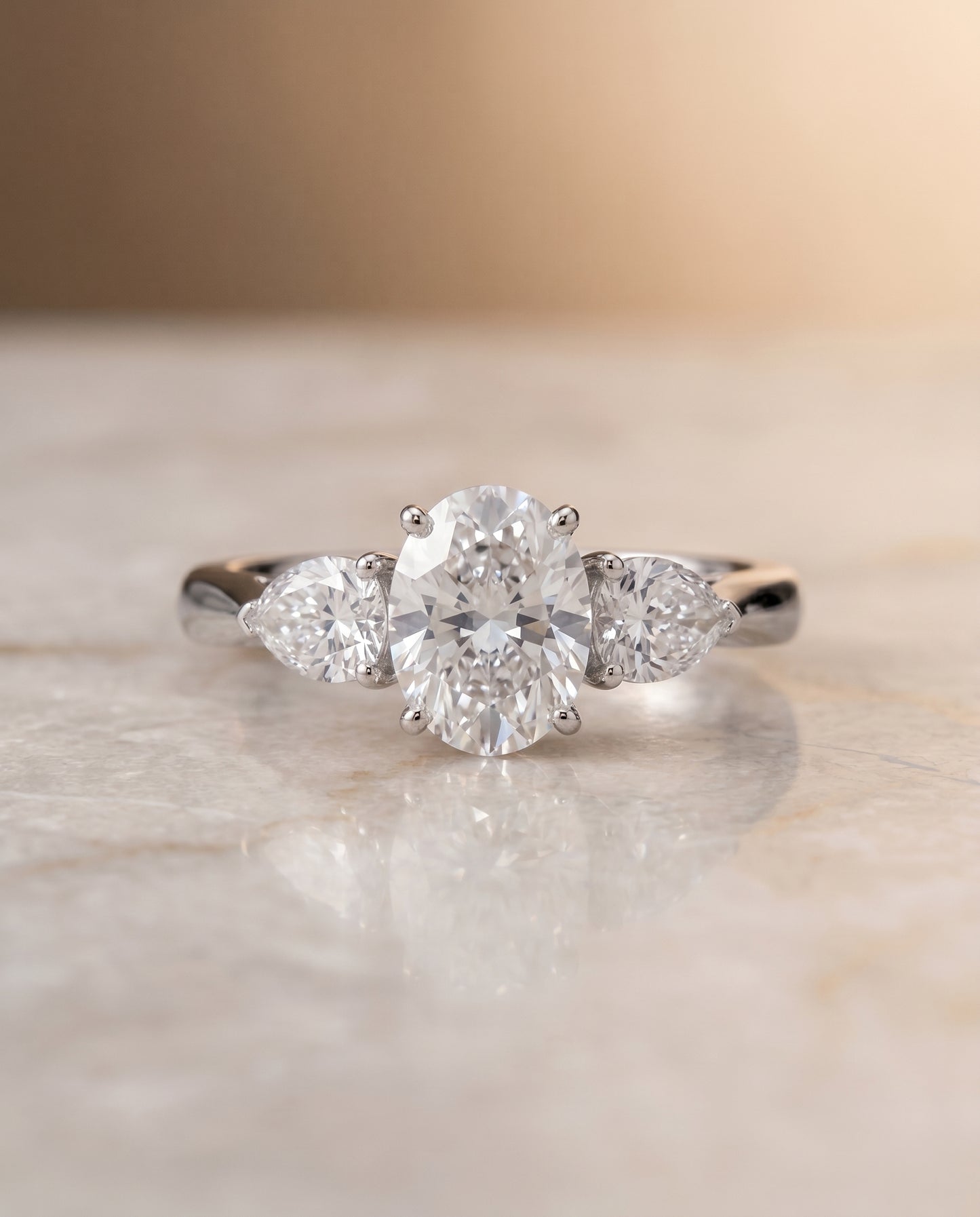 The Angelica Three Stone Engagement Ring Setting for Oval Diamonds in Platinum