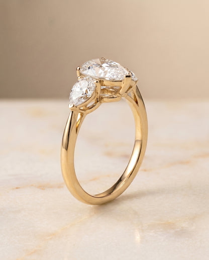The Angelica Three Stone Matched Pear Engagement Ring Setting in 18K Yellow Gold