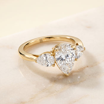 The Angelica Three Stone Matched Pear Engagement Ring Setting in 18K Yellow Gold