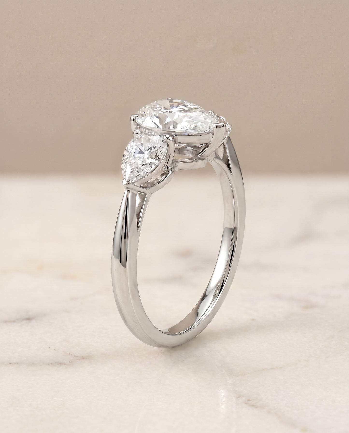 The Angelica Three Stone Matched Pear Engagement Ring Setting in Platinum