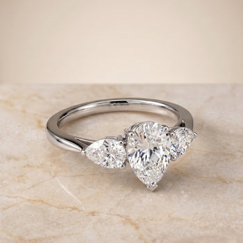 The Angelica Three Stone Matched Pear Engagement Ring Setting in Platinum