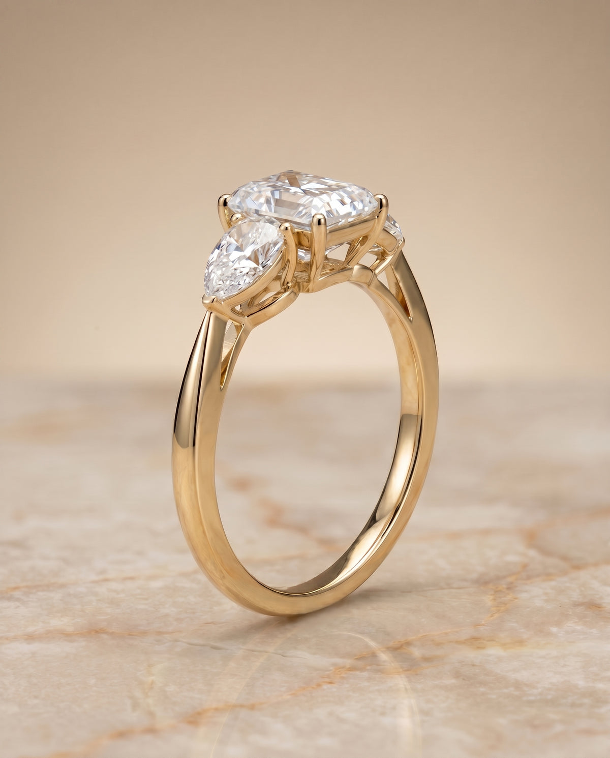 Three Stone Matched Cut styling on The Angelica radiant engagement ring setting | RockHer