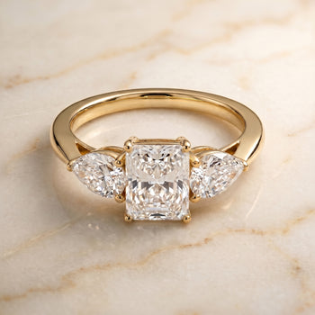 The Angelica Three Stone Matched Radiant Cut Engagement Ring Setting in 18K Yellow Gold