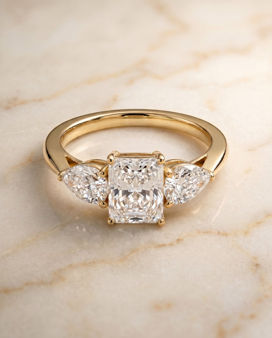 The Angelica Three Stone Engagement Ring Setting for Radiant Diamonds in 18K Yellow Gold