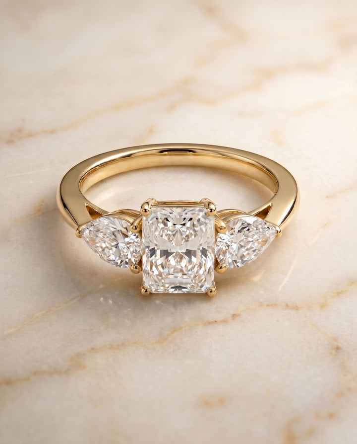 The Angelica Three Stone Matched Radiant Cut Engagement Ring Setting in 18K Yellow Gold