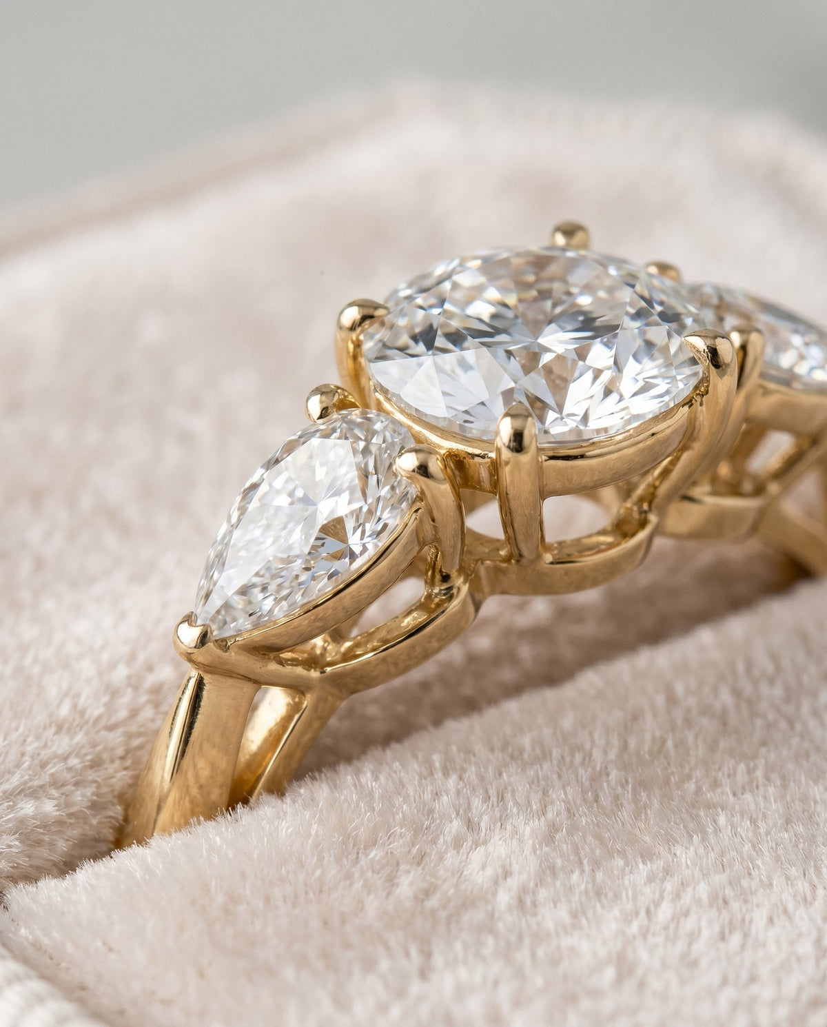 Angelica Select Three Stone Round Lab Diamond Engagement Ring in 18K Yellow Gold, detail view | RockHer