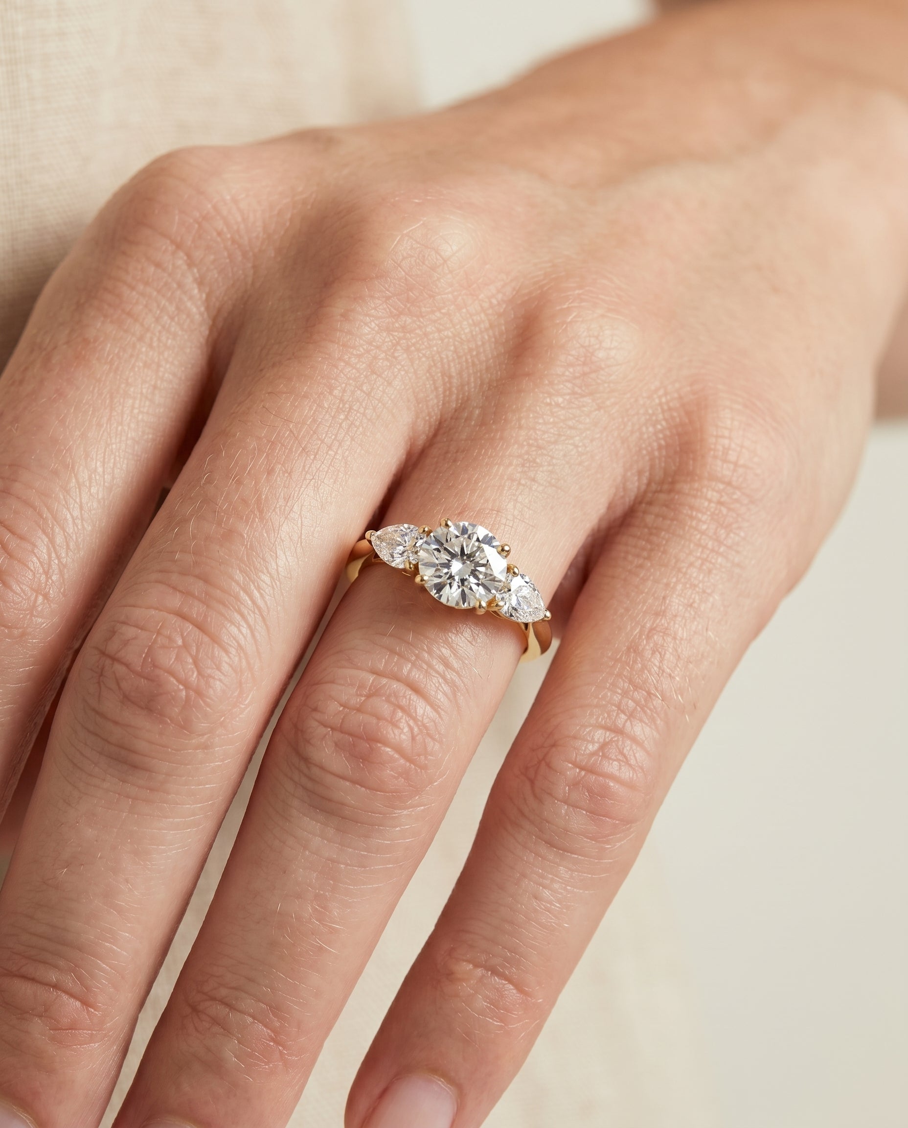 The Angelica engagement ring setting in 18K Yellow Gold, three stone matched design | RockHer