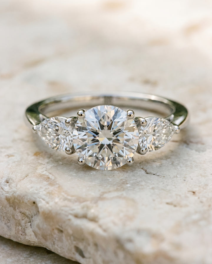 The Angelica Three Stone Engagement Ring Setting for Round Diamonds in Platinum