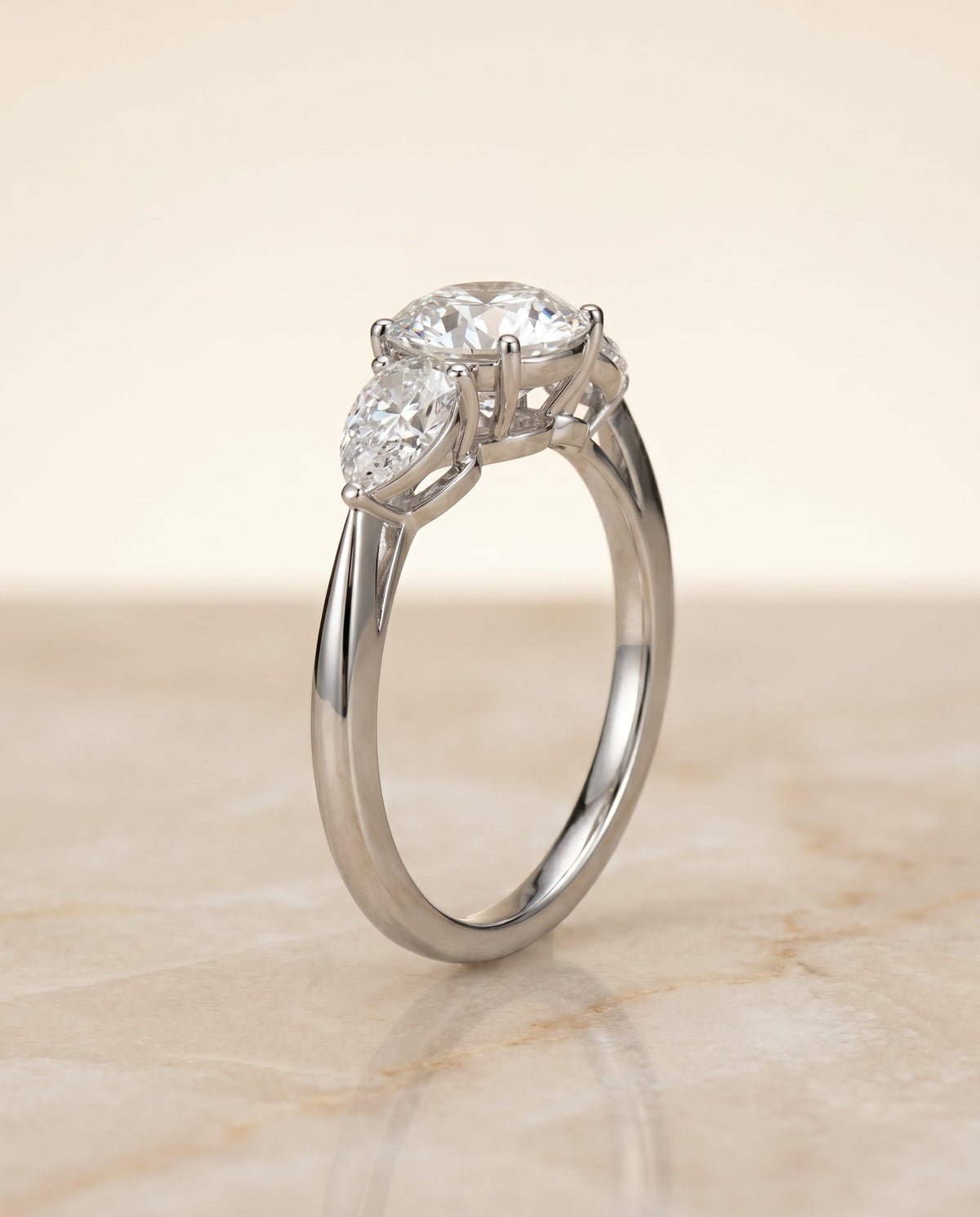 Angelica Select Three Stone Round Lab Diamond Engagement Ring in 18K White Gold, front view | RockHer