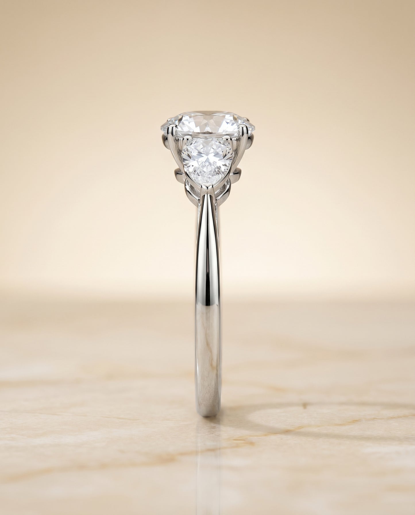 The Angelica Three Stone Engagement Ring Setting for Round Diamonds in Platinum