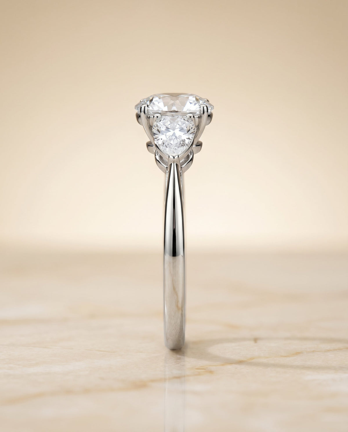 Angelica Select Three Stone Round Lab Diamond Engagement Ring in 18K White Gold, side view | RockHer