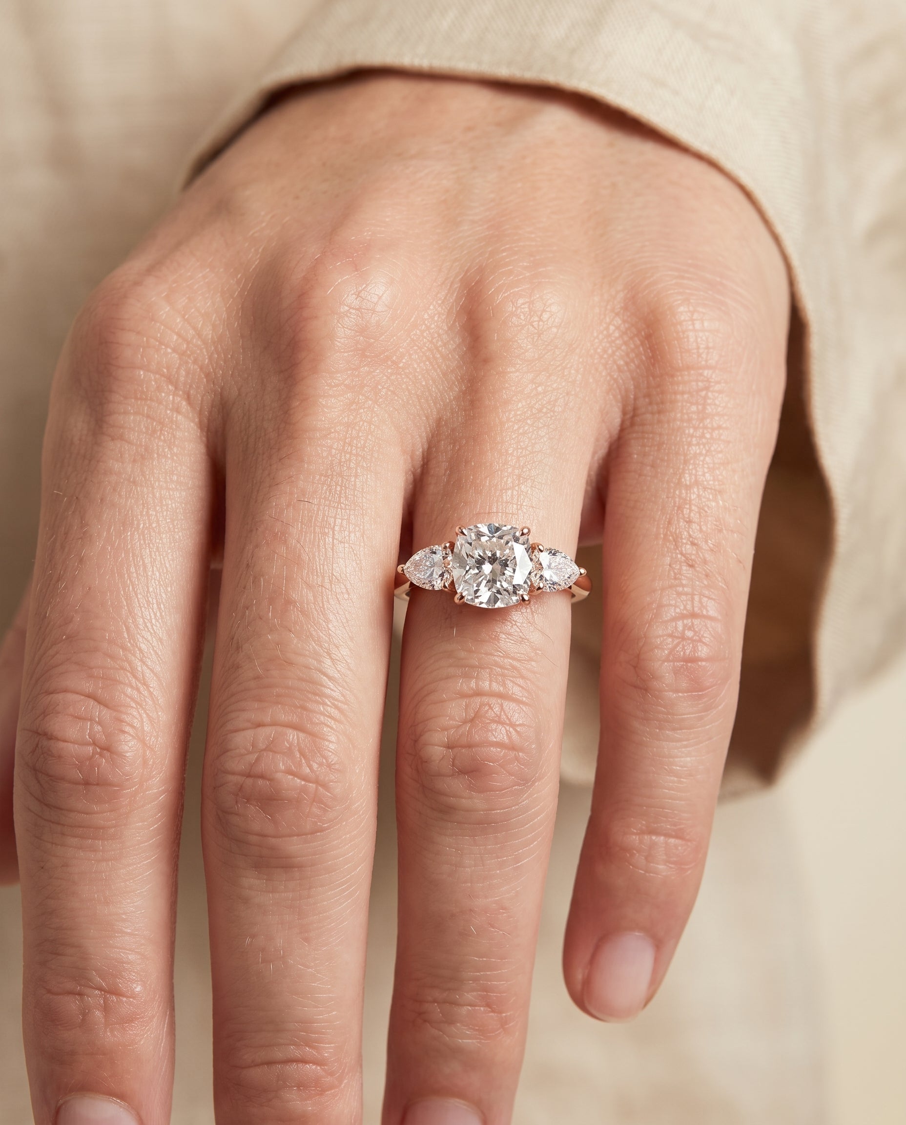 The Angelica engagement ring setting in 14K Rose Gold, three stone matched cut design | RockHer