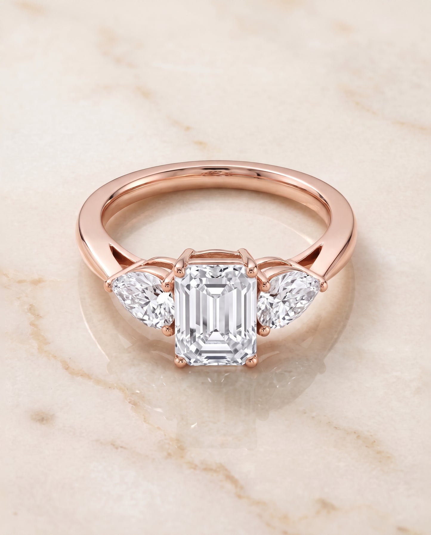 The Angelica Three Stone Matched Emerald Cut Engagement Ring Setting in 14K Rose Gold