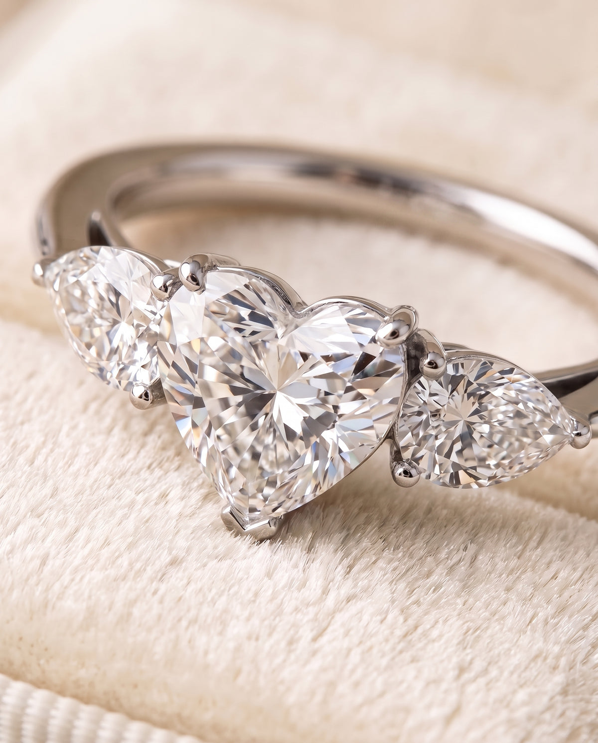 The Angelica Three Stone Matched Heart Engagement Ring Setting in Platinum