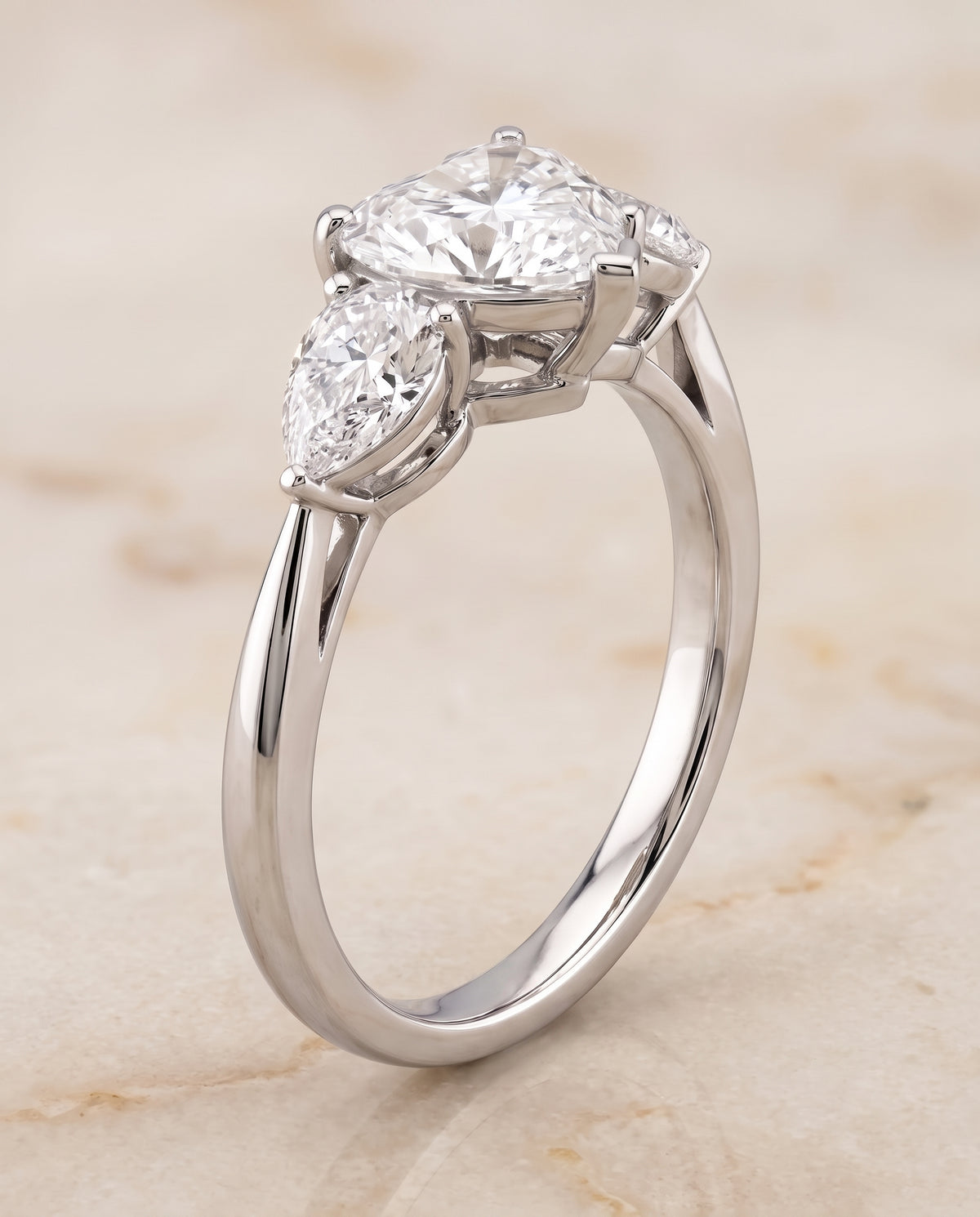 The Angelica Three Stone Matched Heart Engagement Ring Setting in Platinum
