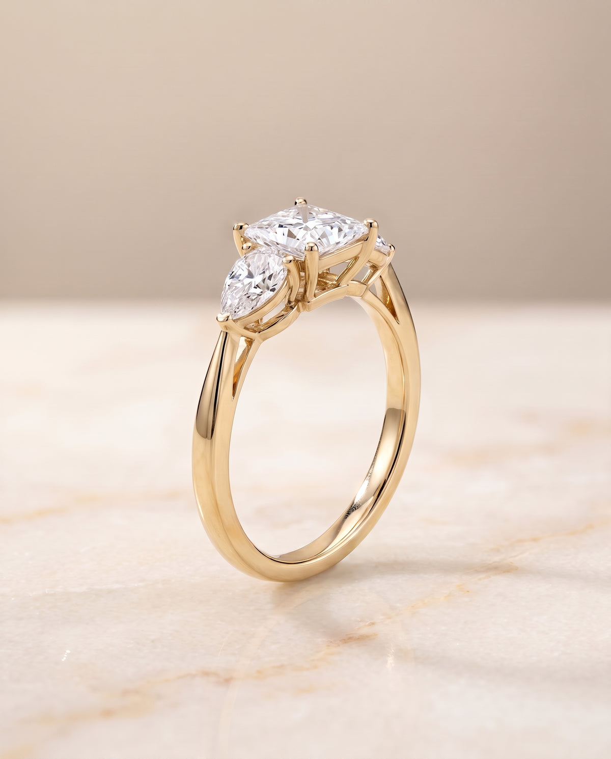Three Stone Matched styling on The Angelica princess engagement ring setting | RockHer