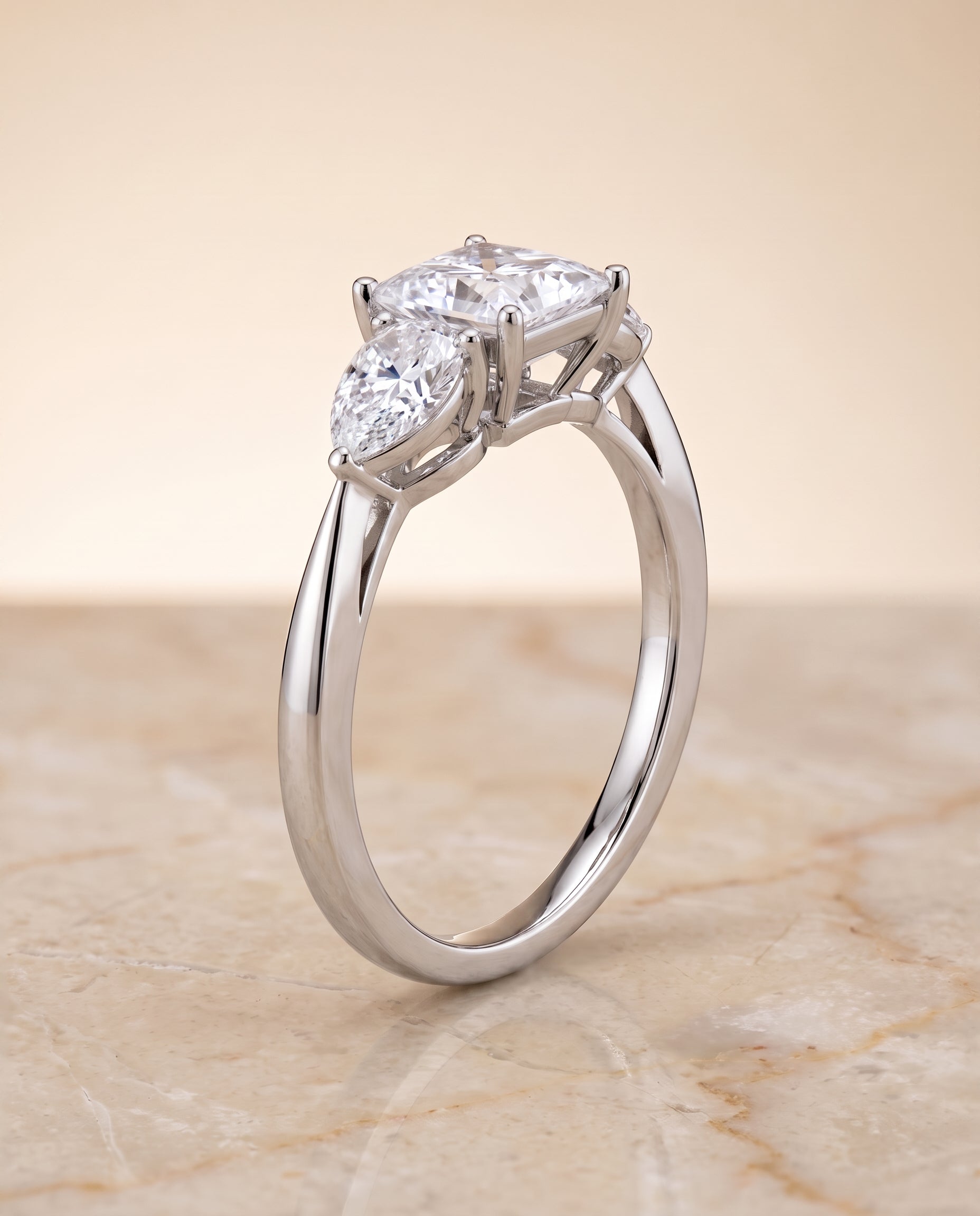 The Angelica Three Stone Matched Princess Cut Engagement Ring Setting in 18K White Gold