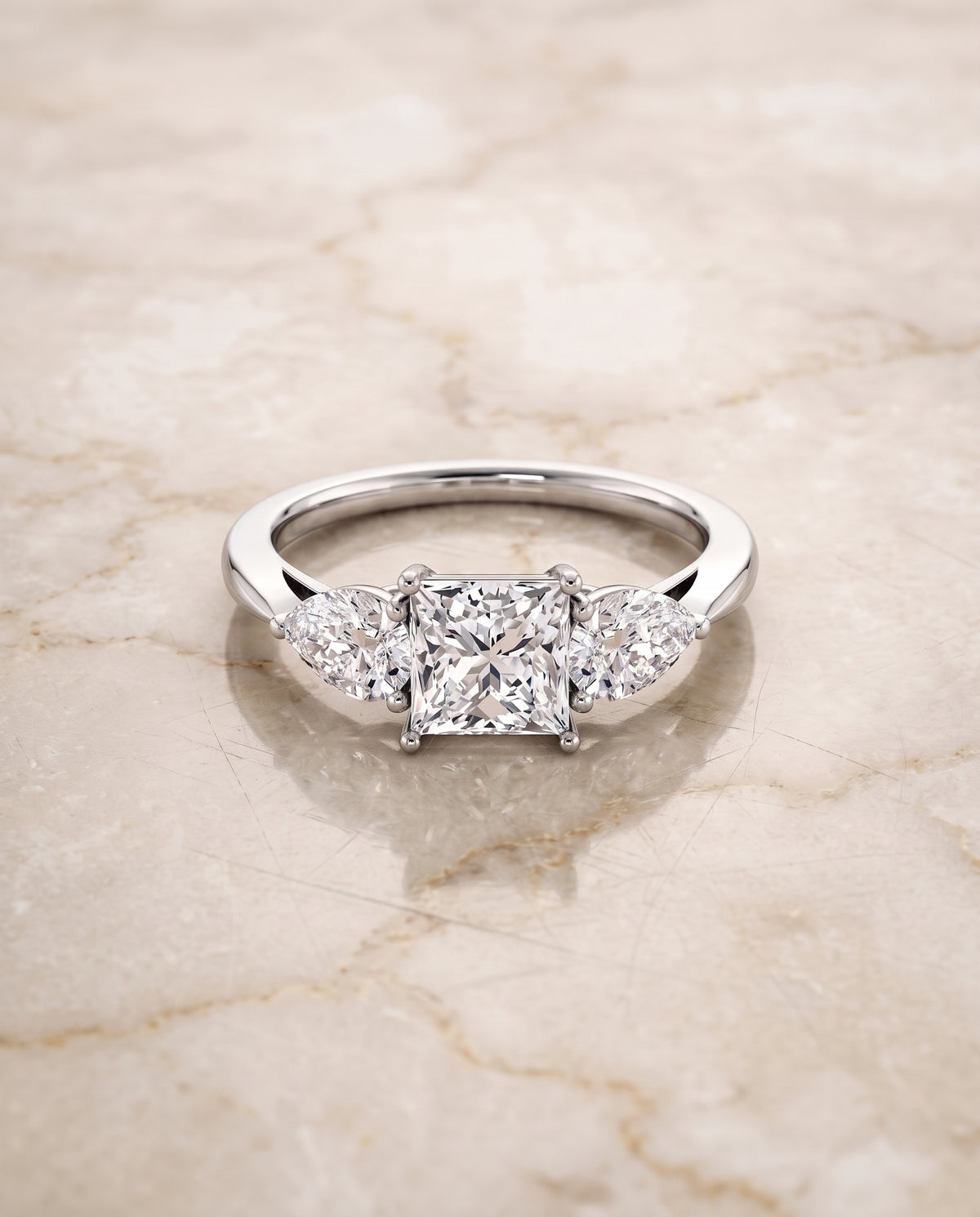 The Angelica Three Stone Matched Princess Cut Engagement Ring Setting in 18K White Gold