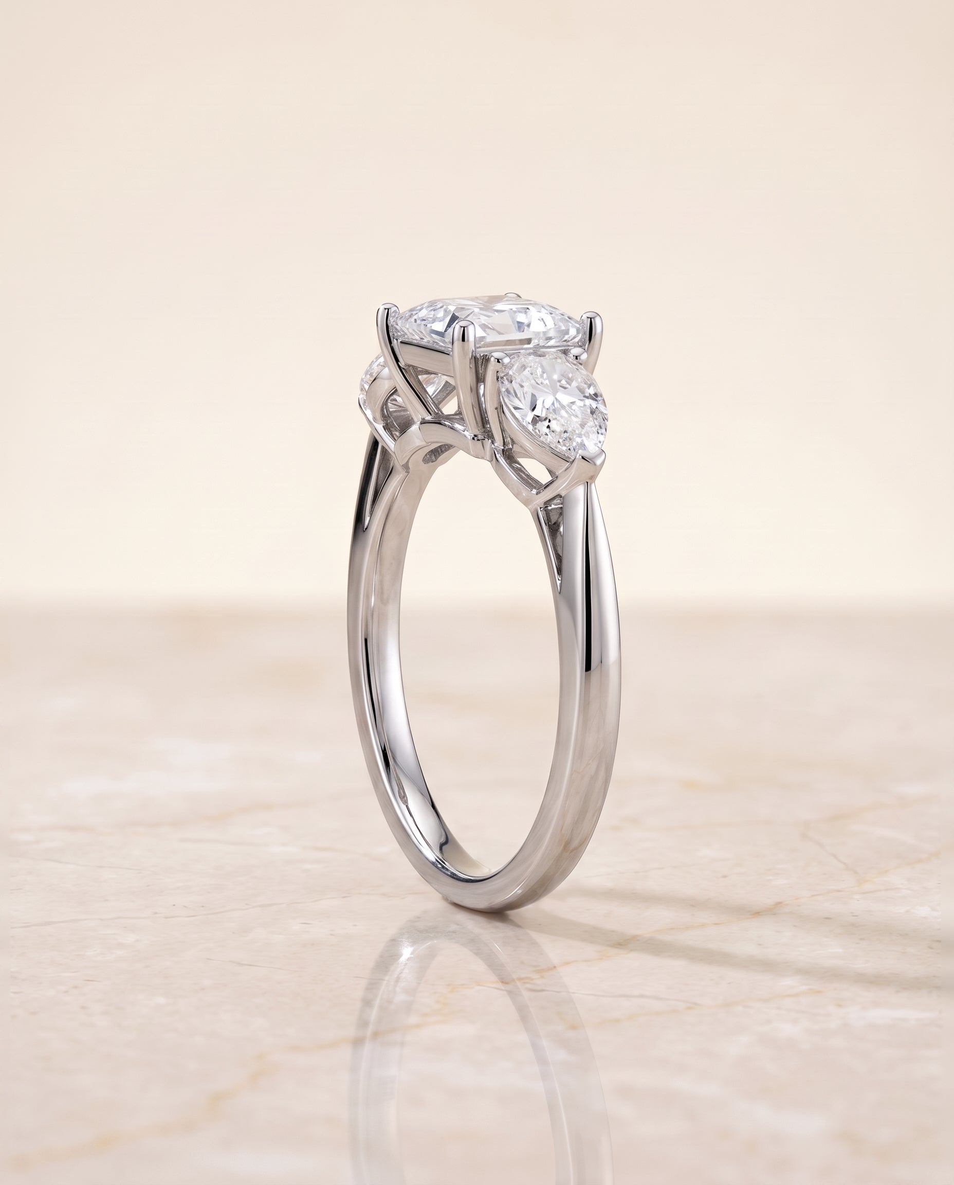 The Angelica Three Stone Matched Princess Cut Engagement Ring Setting in 18K White Gold
