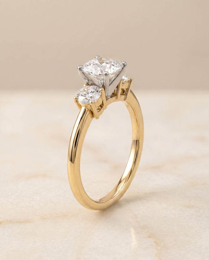The Anita Three Stone Engagement Ring Setting for Cushion Diamonds in 18K Yellow Gold