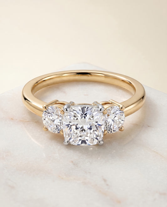 The Anita Three Stone Engagement Ring Setting for Cushion Diamonds in 18K Yellow Gold