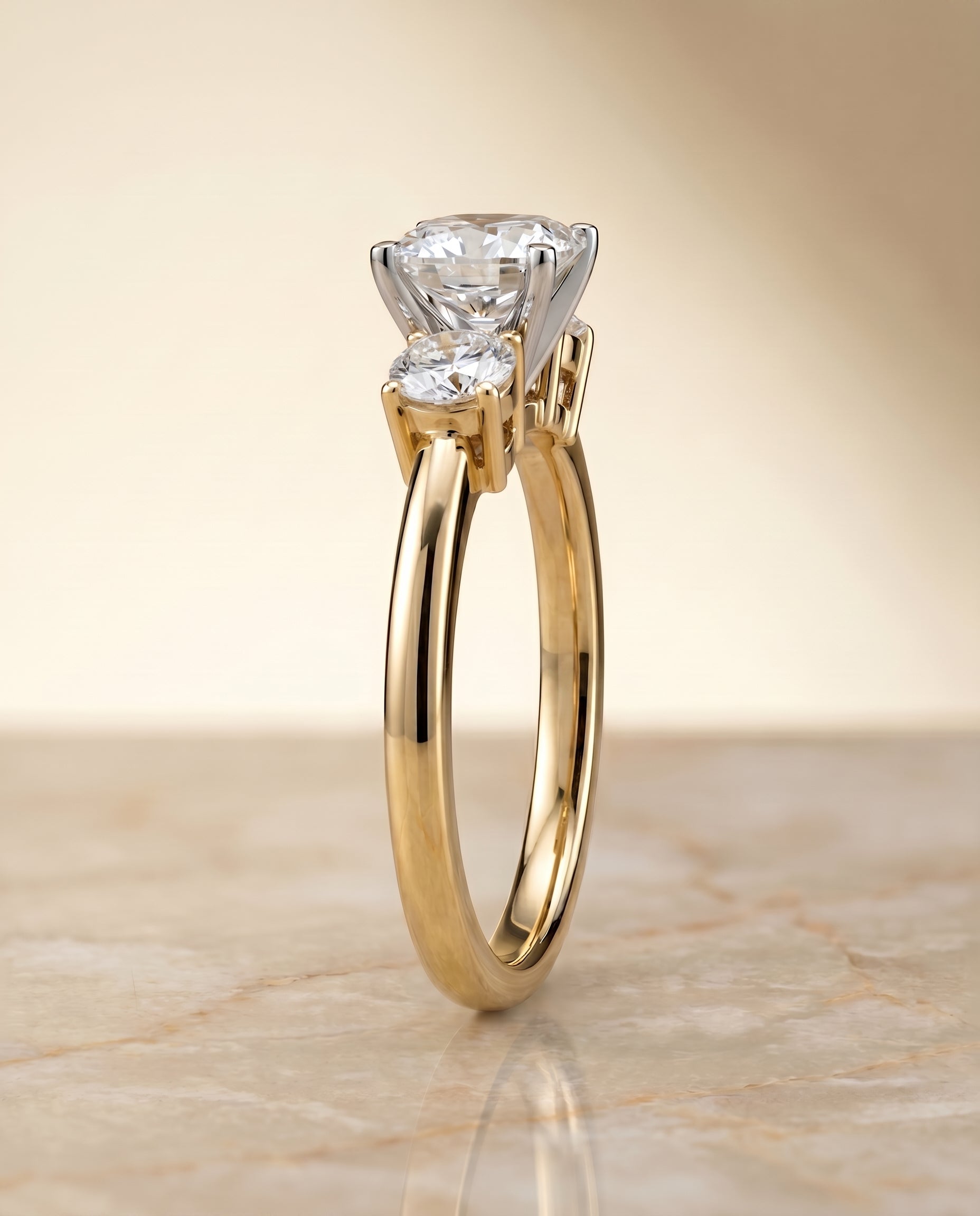 Anita Select Classic Three Stone Solitaire Round Lab Diamond Engagement Ring in 18K Yellow Gold, side view | RockHer